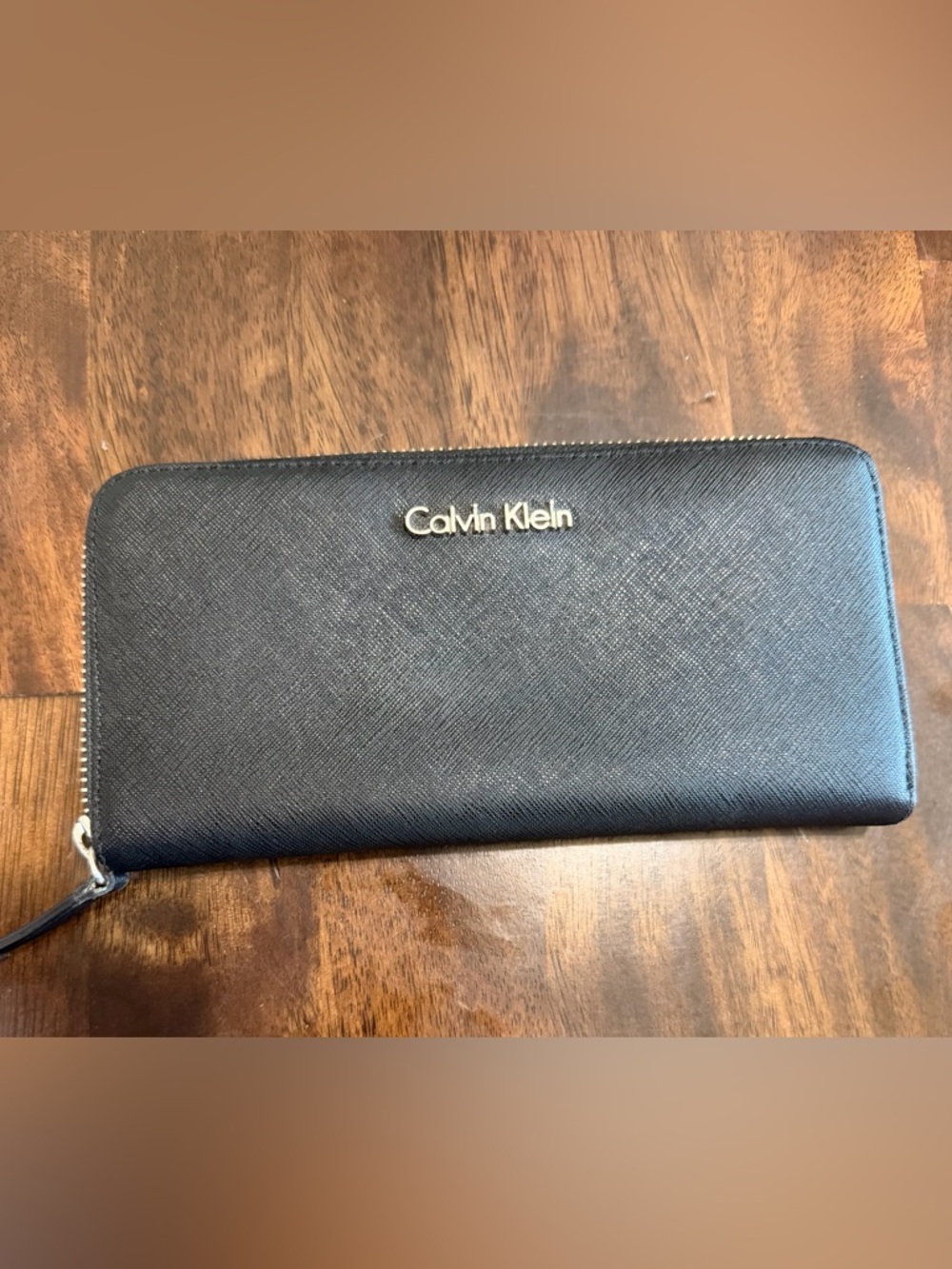 Calvin Klein Black Saffiano Zip Wallet with silver logo